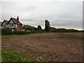 Mock Tudor semi at corner of fields