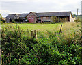 SU0725 : Old farm buildings by Jonathan Kington