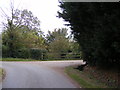 TM3274 : Cratfield Road & the entrance to Low Farm, Huntingfield by Geographer