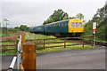 Wensleydale Railway DMU approaching crossing