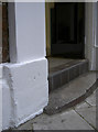 Benchmark in doorway