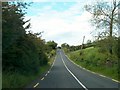 H7108 : The R181 north of the Lisnadarragh Cross Roads by Eric Jones