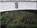 Plaque on the footbridge over the River Carron in Stonehave,