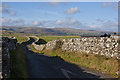 A narrow lane signposted for Shap Abbey