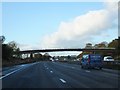 Craddocks Moss Farm and footpath bridge over M6