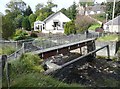 Footbridge and pipe bridge over Muck Water