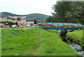 Colourful footbridge across Porset Brook, Caerphilly