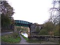 Marple railway viaduct crosses over the Peak Forest Canal