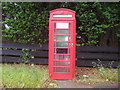 Red phone box on The Street, Clandon