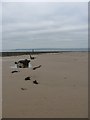 SS4496 : Military debris in the sands of Whiteford Point by Richard Law