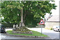 A historic pinnacle in the centre of Bourton village