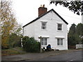 Footpath near weatherboarded house