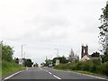 The A509 approaching the junction with the B127 at the southern outskirts of Derrylin