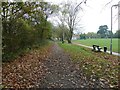 Downs Link path passing Cranleigh Recreation Ground and pavilion