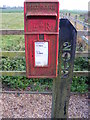 TM3684 : White Horse Farm Postbox by Geographer