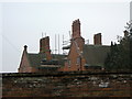 SK6232 : Chimney stacks at Normanton Manor by Alan Murray-Rust