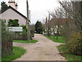 Unadopted road, with rural housing