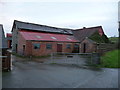 Farm outbuildings beside the A458 road