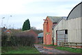 SJ7833 : Entrance to Charnes Old Hall farm by Mick Malpass