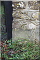 Benchmark on Threshing Barn Cottage, Burton Hill