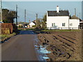 TF3123 : Former gate house and level crossing on Hog's Gate near Moulton by Richard Humphrey