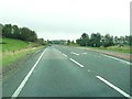 NX6154 : A staggered crossroads on the A75 by Ann Cook