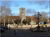 SU1405 : Ringwood: Market Place and parish church by Chris Downer