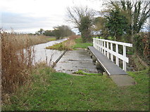 SK7385 : Weir and footbridge by Jonathan Thacker