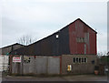 SD4746 : Corrugated iron building at Ford Green by Karl and Ali