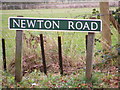 TG2219 : Newton Road sign by Geographer
