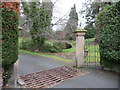 The gate and pond at Ford Hall