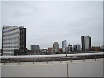 TQ3884 : Buildings and railway lines in Stratford, viewed from Westfield Way by Robert Lamb