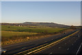 A view of the M61 from Hut Lane bridge with Winter Hill and Rivington Pike beyond