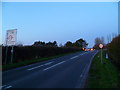 The A286 approaching the junction with Wophams Lane