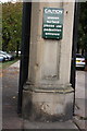 Benchmark on gatepost at entrance to St Mary