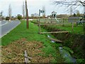 Footpath leaves road at Hunston