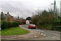 The main road through Exminster, at the junction with Glebelands