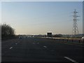 Power lines cross the westbound M62