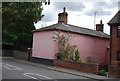 Pink washed house, Station Rd