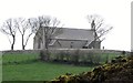 Bright Parish Church seen across a bank of whins