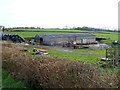 Farm buildings and black storage bags, Sluvad Road east of New Inn