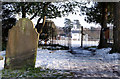 TL5646 : Linton churchyard after snowfall by M H Evans