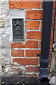 Benchmark on Corner House, Church Green