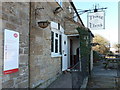 ST6514 : North Wootton: post office sign on the Three Elms by Chris Downer