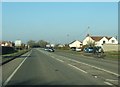 Houses near the A38 staggered crossroads at Heathfield