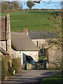 Oborne: thatched farmhouse and hillside