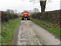 Farm traffic on the lane linking Ballykeel and Lurgancahone Roads