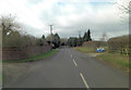 SU7383 : Greys Road passes Grange Farm entrance by Stuart Logan