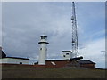 NZ5333 : Lighthouse and radio tower, The Headland by JThomas