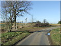 TL8538 : Country Road And Footpath by Keith Evans
